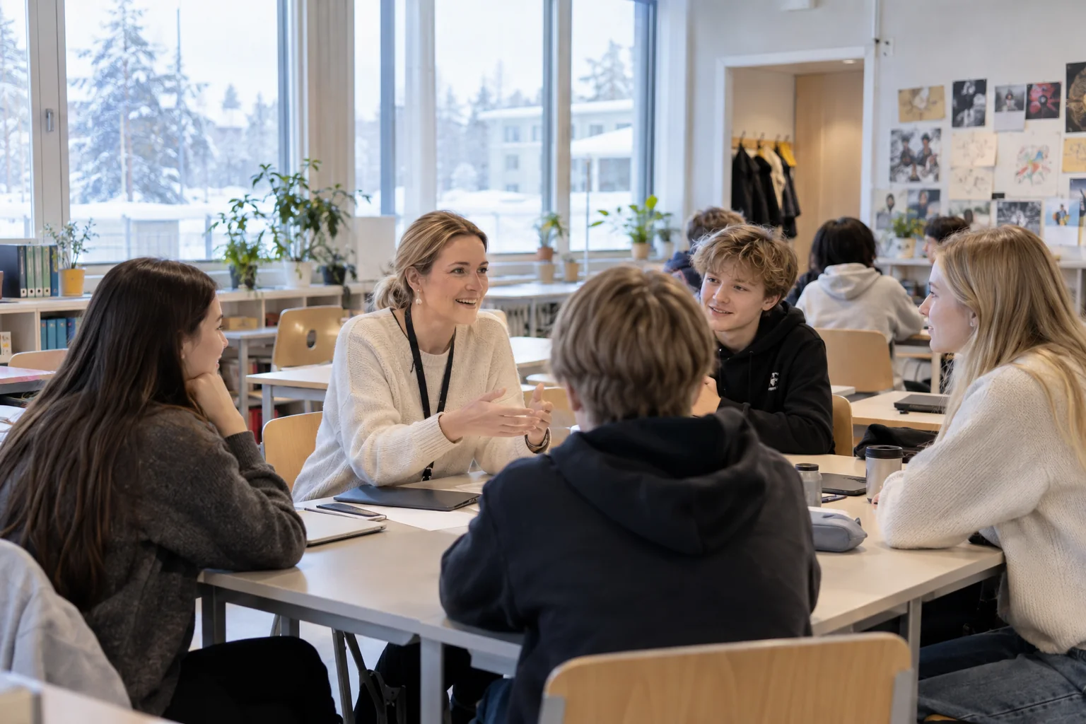 Teacher and students in a bright classroom